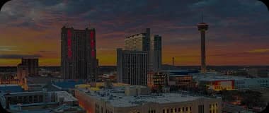 San Antonio skyline with the Tower of the Americas and city lights at dusk