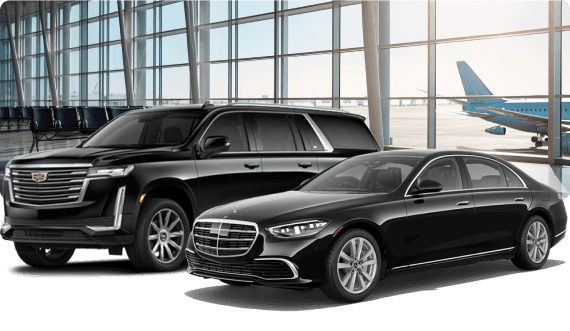 Luxury black SUV and sedan parked inside an airport terminal, with a jet visible through the glass windows in the background.